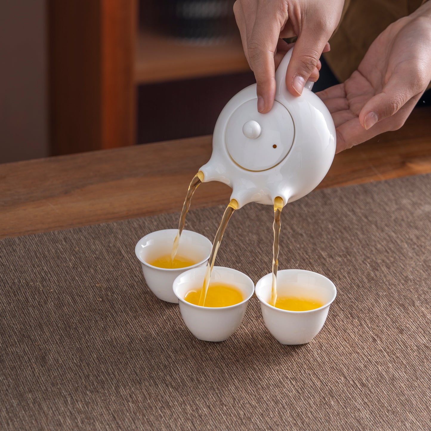 Tri-spout “Three People Walking” Porcelain Teapot